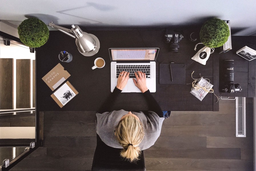 job seeker looking for home-based online jobs on her laptop