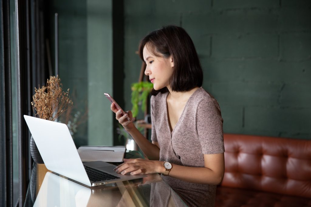 young Asian woman in a remote work setting